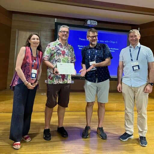 10-Year Test-of-Time Award presented to Torsten Schaub and Martin Gebser by Laura Giordano and Wolfgang Faber, picture by Susanne Schaub